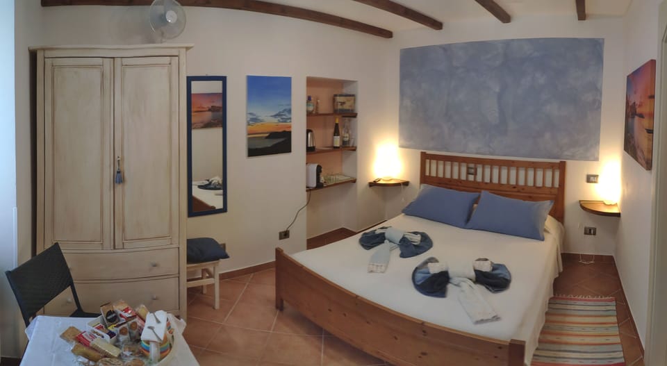Double Room | Down comforters, individually decorated, iron/ironing board, free WiFi