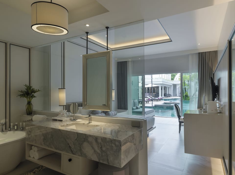 Deluxe Room, Pool Access | Bathroom | Separate tub and shower, deep soaking tub, rainfall showerhead