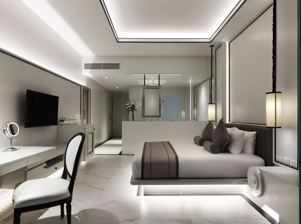Deluxe Room, Pool Access | Premium bedding, minibar, in-room safe, individually decorated