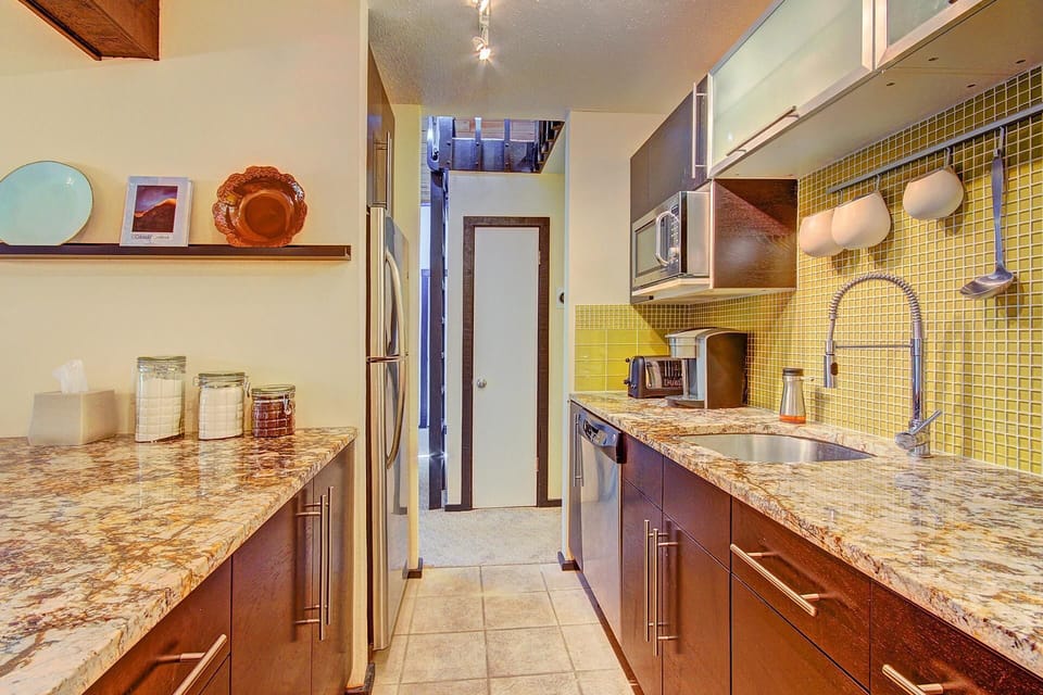Condo, 2 Bedrooms | Private kitchen | Fridge, microwave, oven, dishwasher