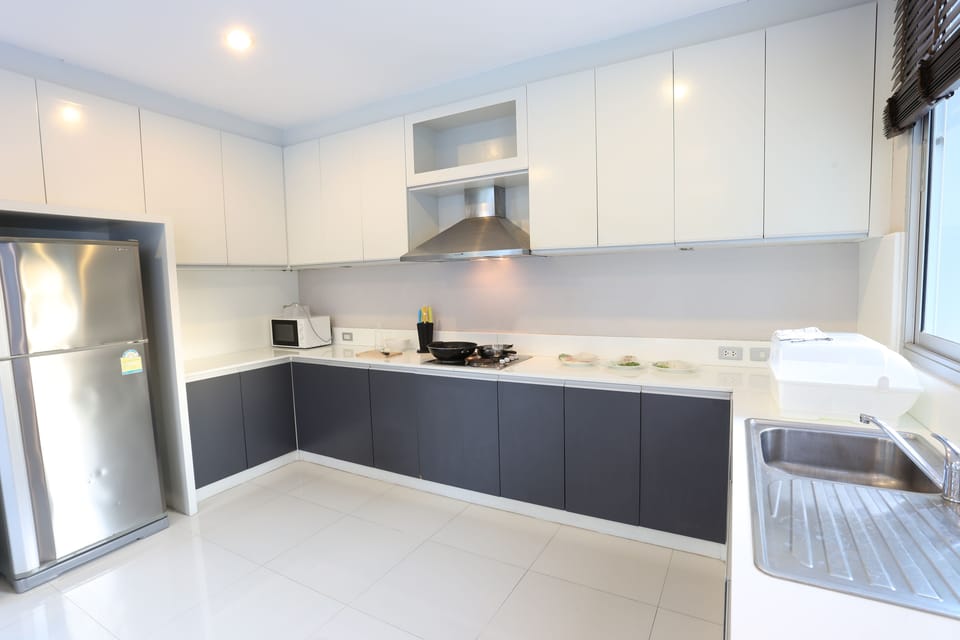 Villa | Private kitchen | Full-size fridge, microwave, stovetop, electric kettle
