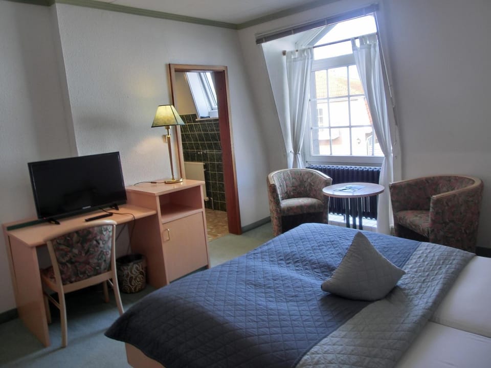 Desk, free WiFi, bed sheets