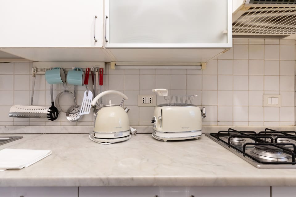 Apartment, 1 Queen Bed | Private kitchen | Fridge, microwave, oven, stovetop
