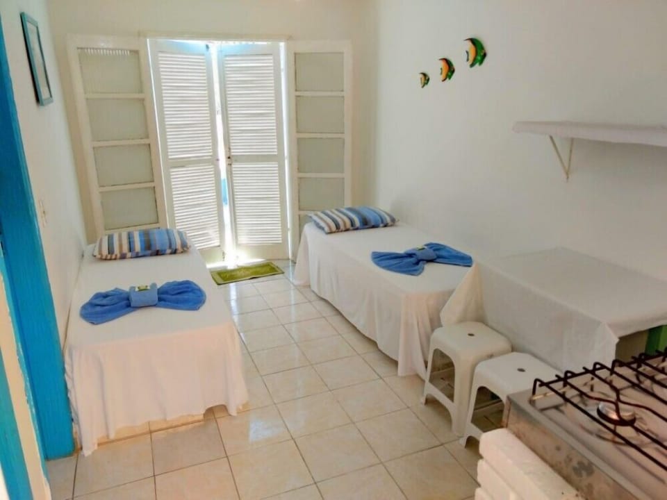 Quarto Quadruplo com Ventilador | 1 bedroom, free WiFi, bed sheets, wheelchair access