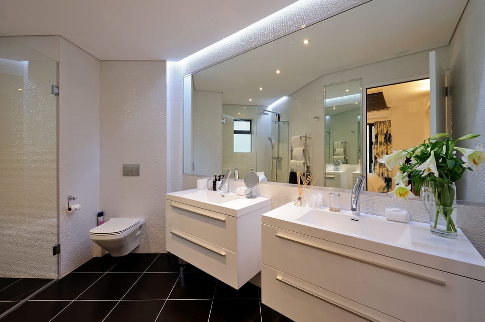 Designer toiletries, bathrobes, slippers, towels
