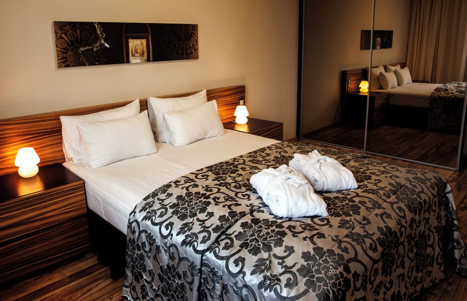 Standard Apartment, 1 Bedroom | Premium bedding, minibar, desk, blackout drapes