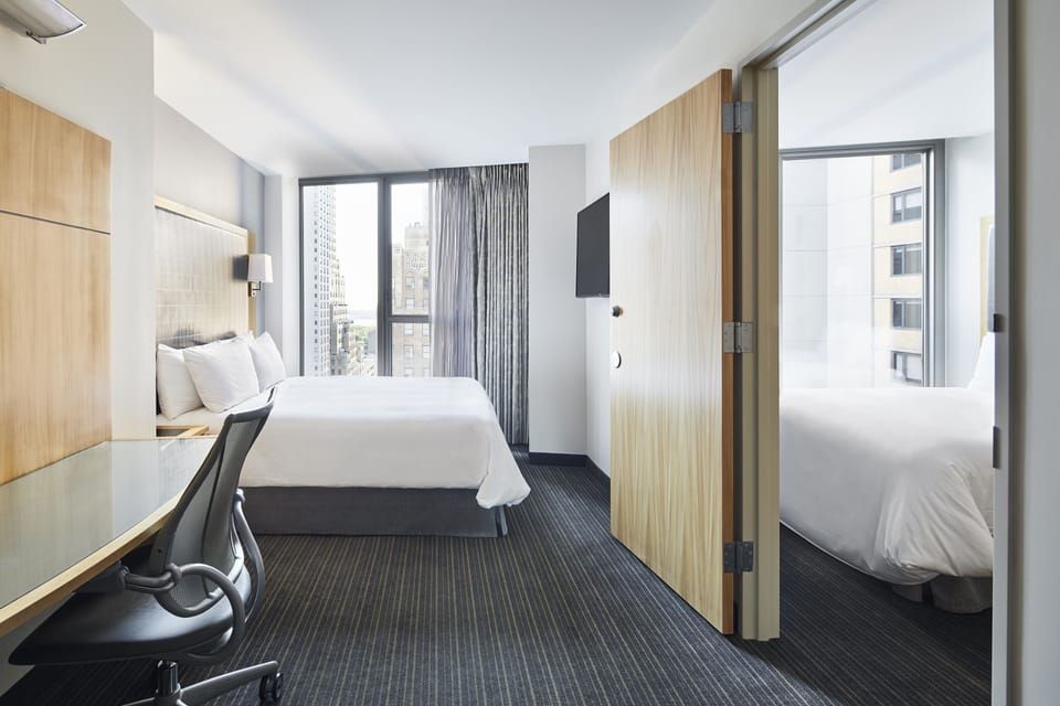 Family Room, 2 Queen Beds | 1 bedroom, premium bedding, desk, laptop workspace