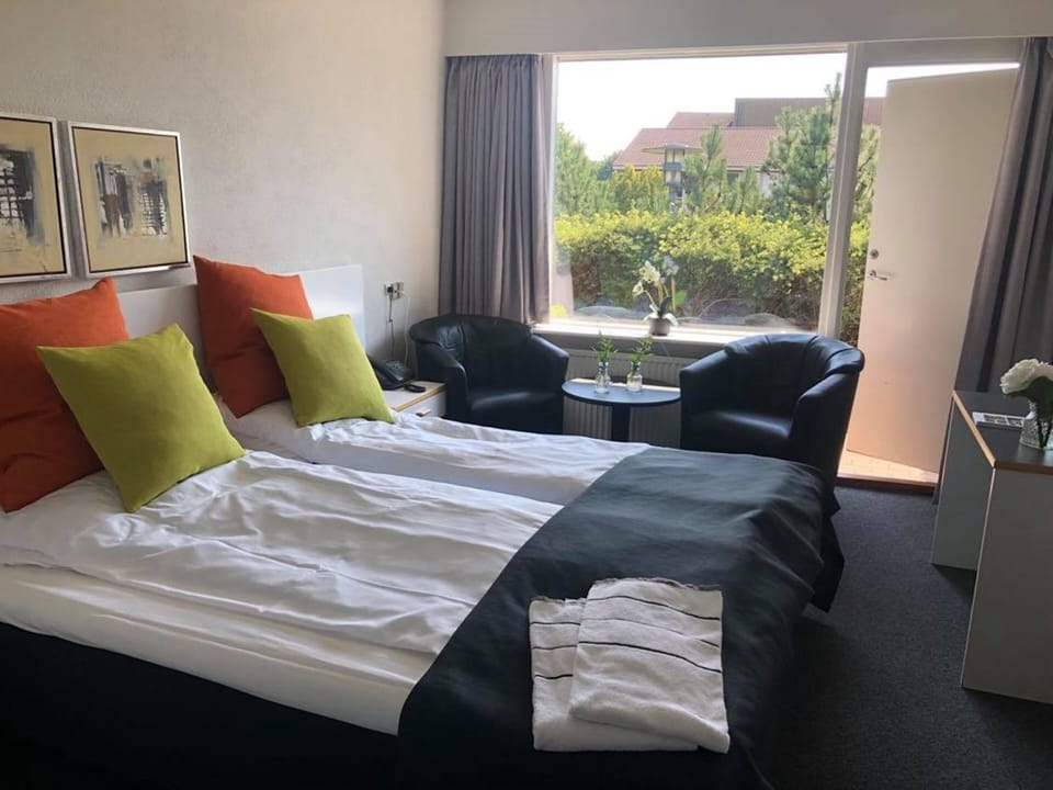 Desk, free WiFi, bed sheets, alarm clocks