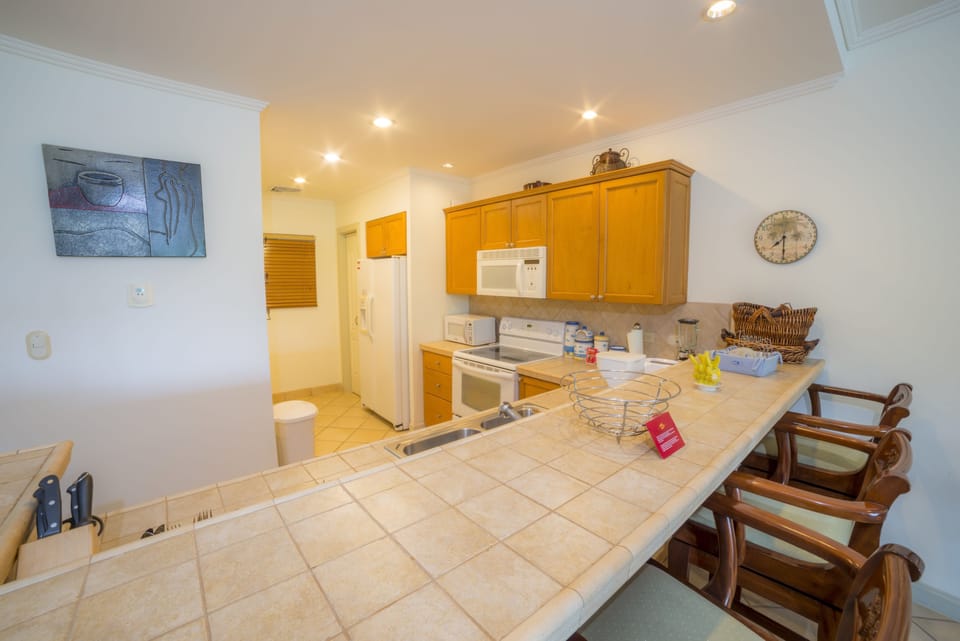 Condo, Multiple Beds (Los Suenos Resort Del Mar 3I) | Private kitchen | Coffee/tea maker, full-size fridge, microwave, oven
