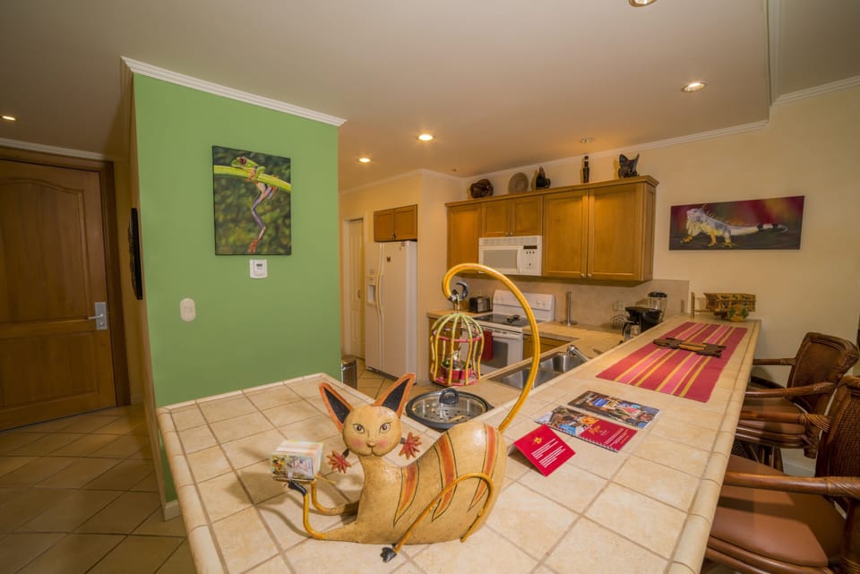 Condo, Multiple Beds, Non Smoking | Private kitchen | Coffee/tea maker, full-size fridge, microwave, oven