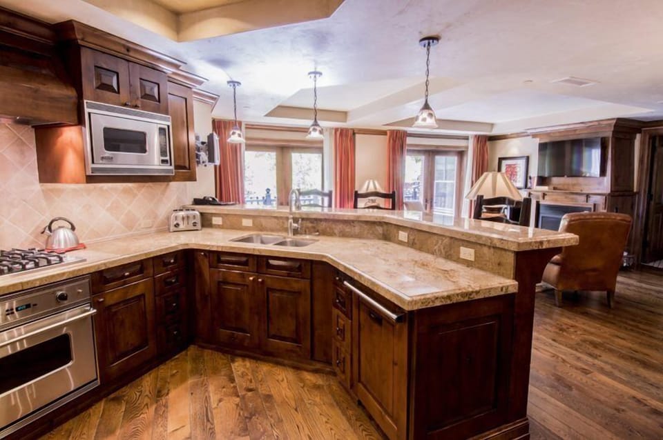 Condo (Aspen_Hyatt_Grand_3bed) | Private kitchen | Fridge, microwave, oven, cookware/dishes/utensils