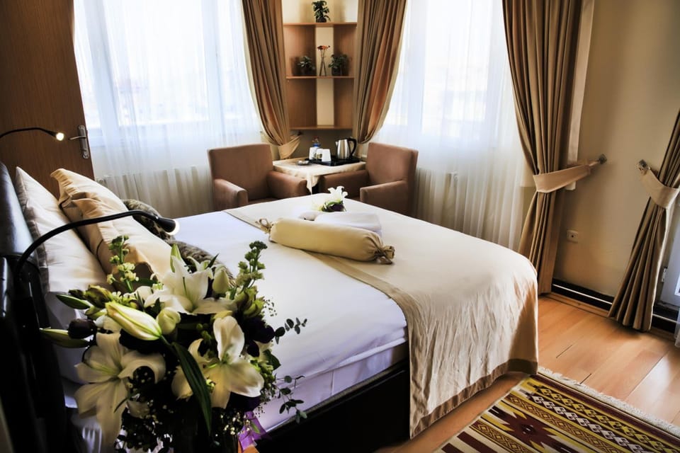 Premium bedding, down comforters, minibar, in-room safe
