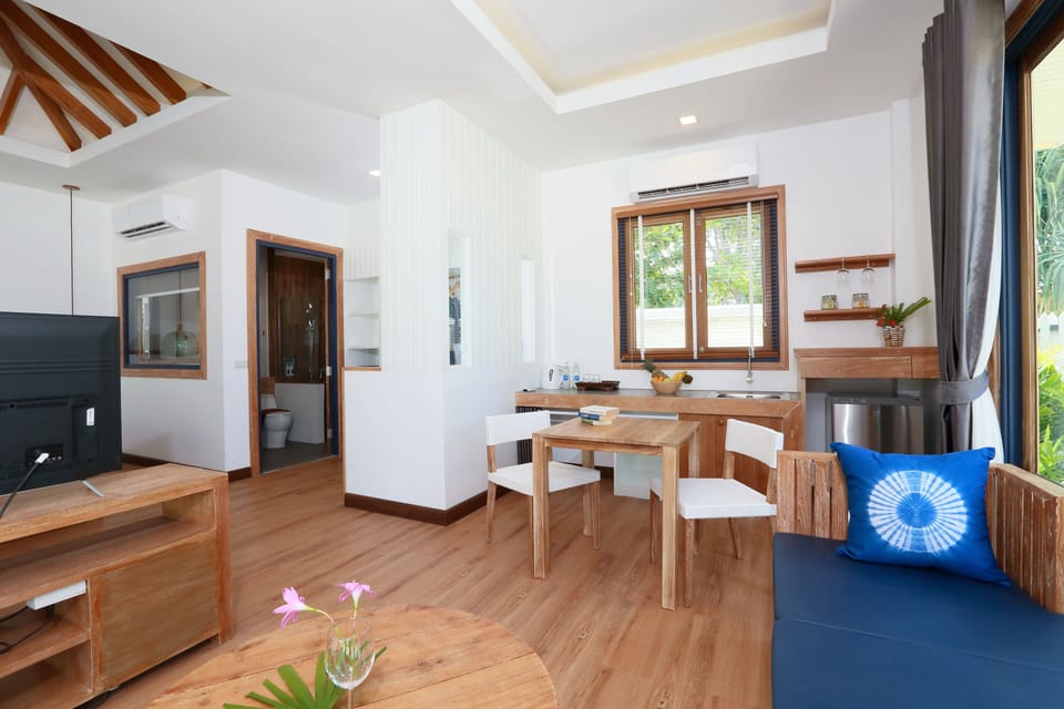 Villa, Beachfront | Living area | 43-inch Smart TV with cable channels, TV, Netflix