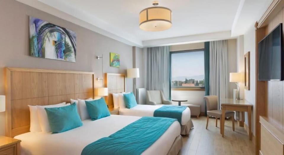 Family Triple Room | Premium bedding, minibar (free items), in-room safe, desk