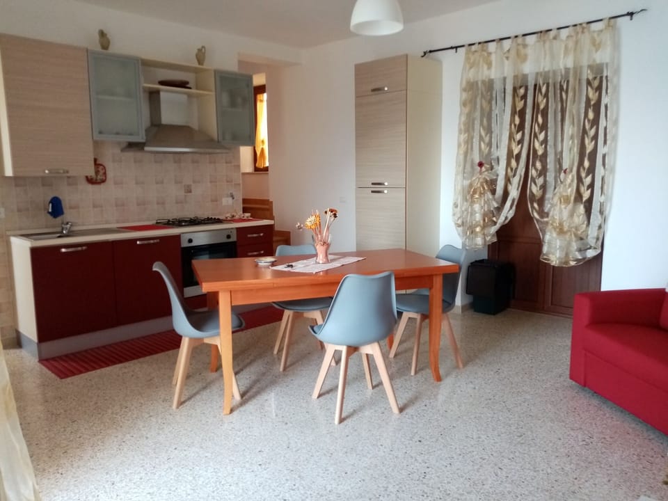 Exclusive Apartment, 1 Bedroom, Beachfront | Living area | Flat-screen TV
