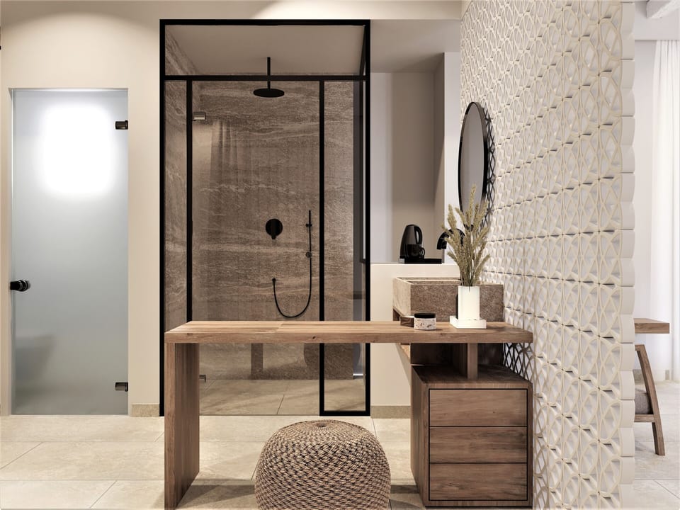 Signature Studio Suite | Bathroom | Shower, rainfall showerhead, designer toiletries, hair dryer