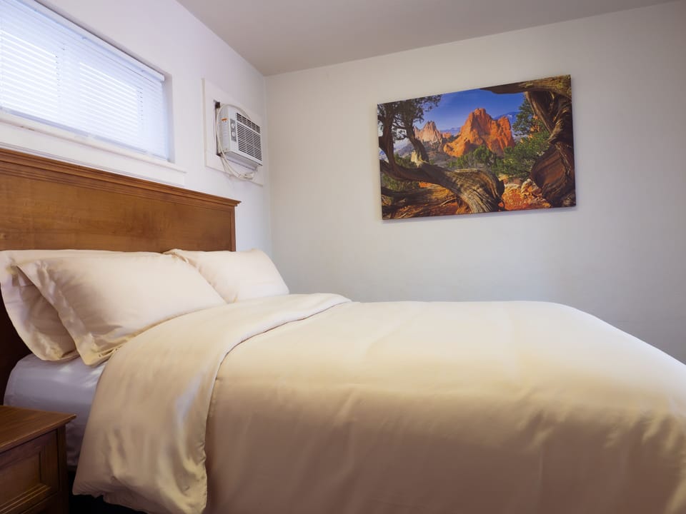 Private Room - Accommodates up to 4 People | Down comforters, iron/ironing board (on request), WiFi (free)