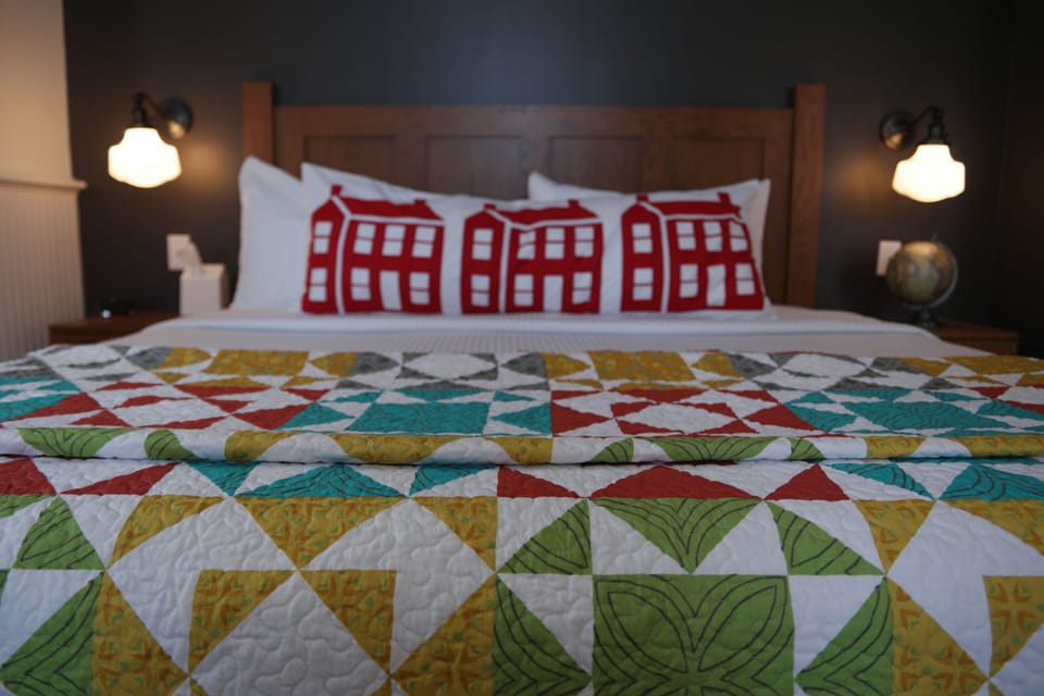 Premium bedding, desk, blackout drapes, iron/ironing board