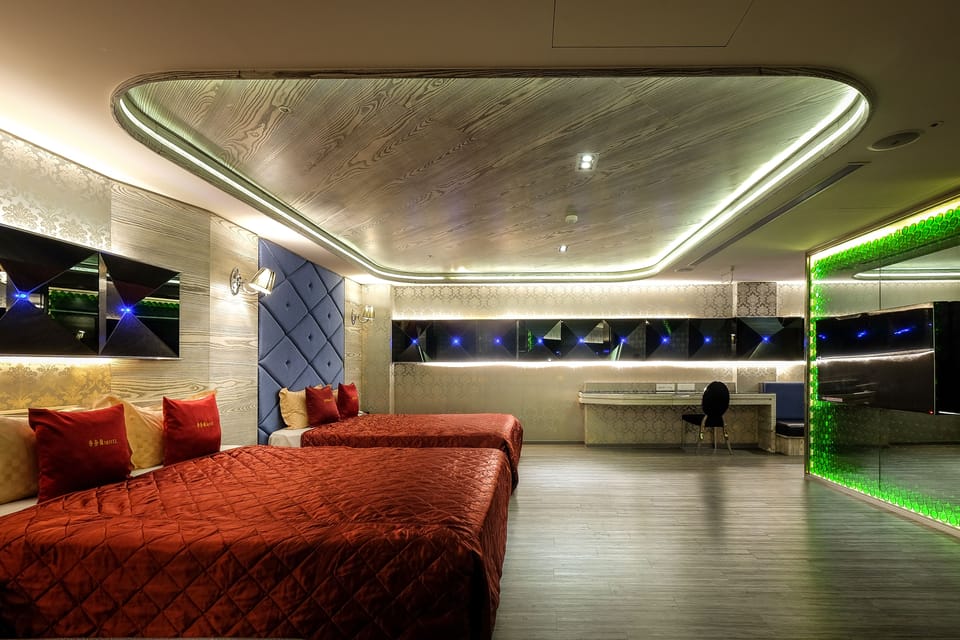 Superior Quadruple Room, Multiple Beds, Non Smoking | Free minibar, individually furnished, desk, blackout drapes