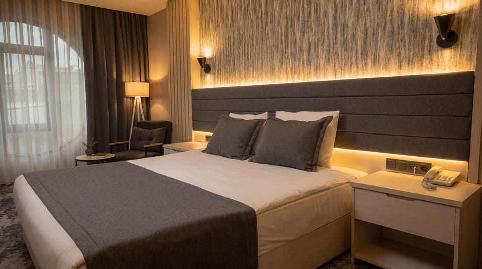 Standard Double Room Single Use, 1 Queen Bed | Frette Italian sheets, premium bedding, Select Comfort beds, minibar
