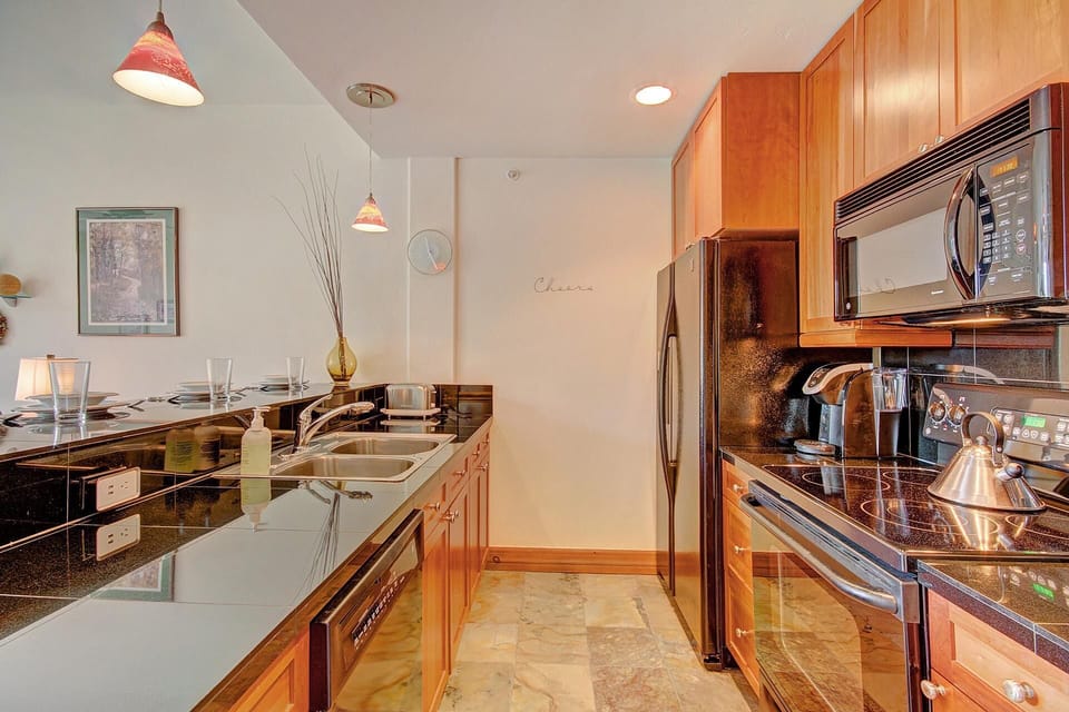 Condo, 2 Bedrooms | Private kitchen | Coffee/tea maker, fridge, oven, toaster