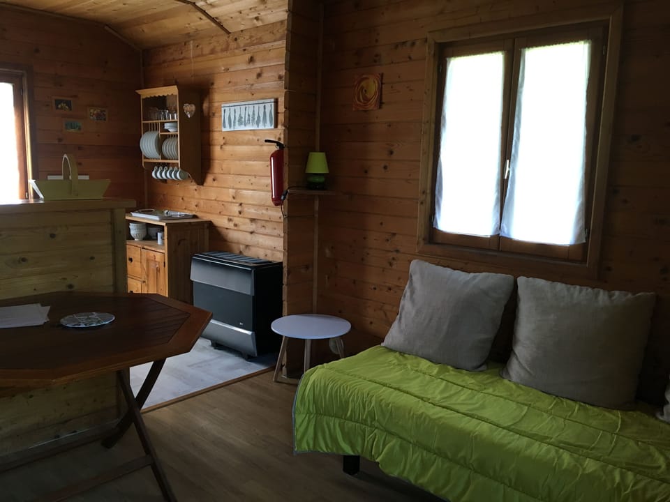 Chalet, 2 Bedrooms | Living area | Flat-screen TV