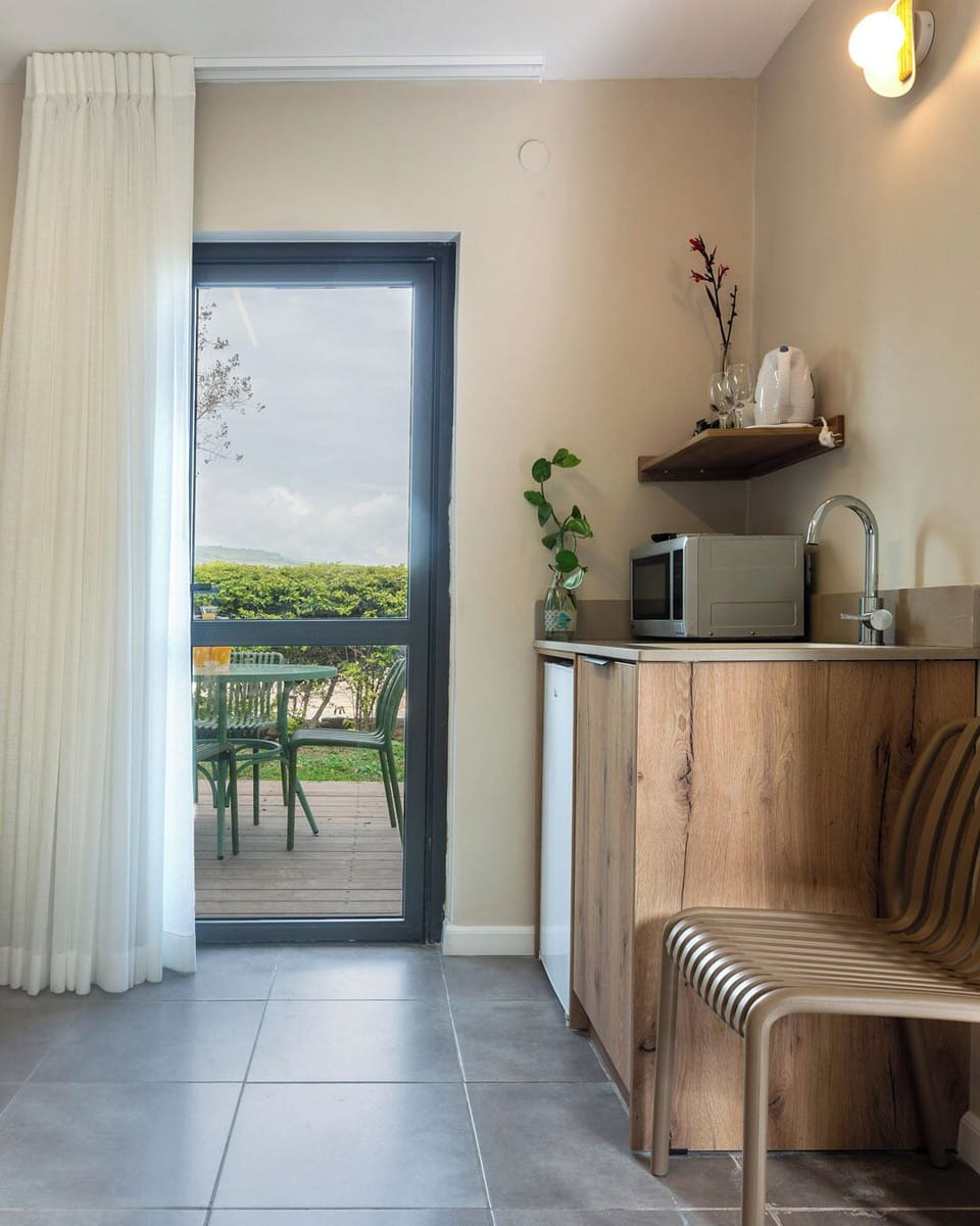 Family Room, Garden Area | Desk, blackout drapes, cribs/infant beds, free WiFi