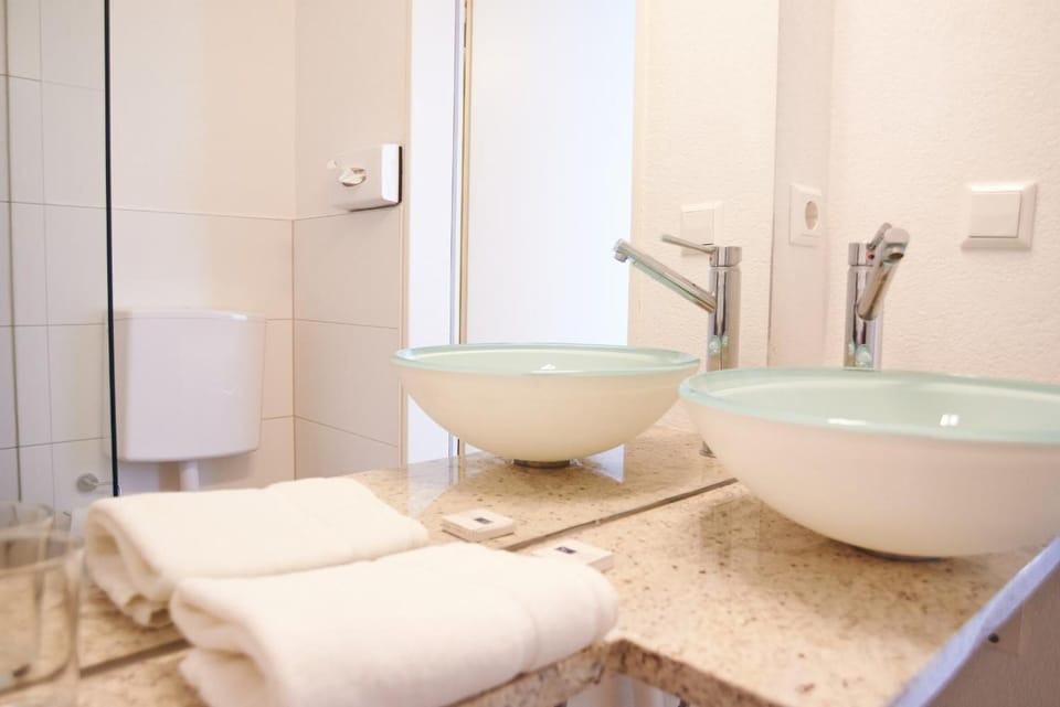 Shower, free toiletries, hair dryer, towels