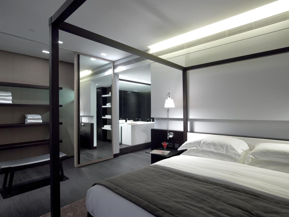 Hypo-allergenic bedding, down comforters, minibar, in-room safe