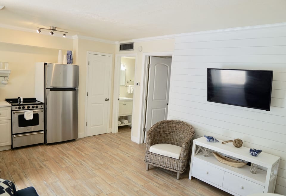 Suite, 1 Bedroom (Gulf Side) | Living room | Flat-screen TV