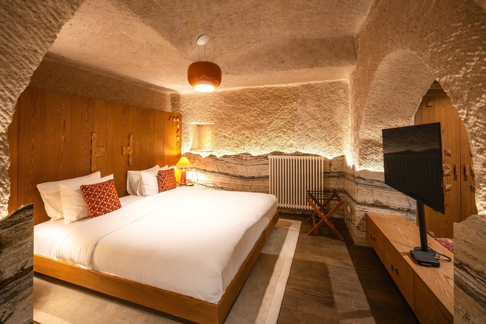 Junior Cave Suite with Fireplace | Premium bedding, minibar, in-room safe, iron/ironing board (on request)