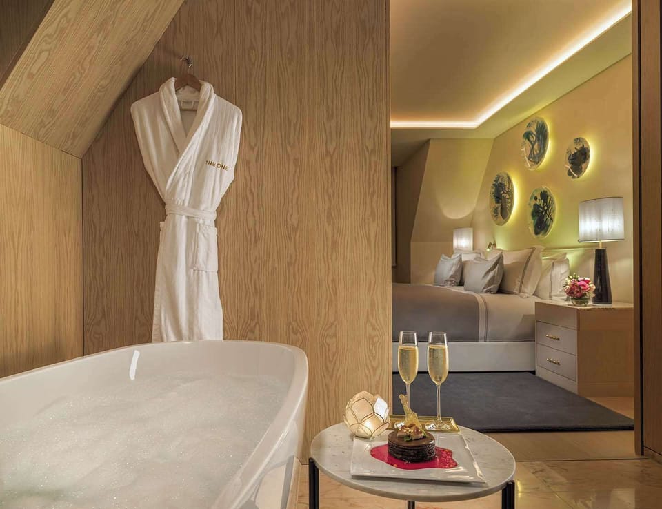 Signature Suite (Garden) | Bathroom | Designer toiletries, hair dryer, bathrobes, slippers
