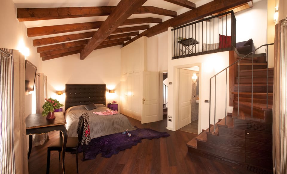 Superior Quadruple Room | In-room safe, blackout drapes, soundproofing, iron/ironing board