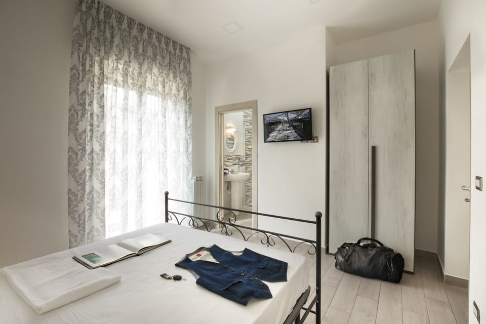 Frette Italian sheets, premium bedding, down comforters