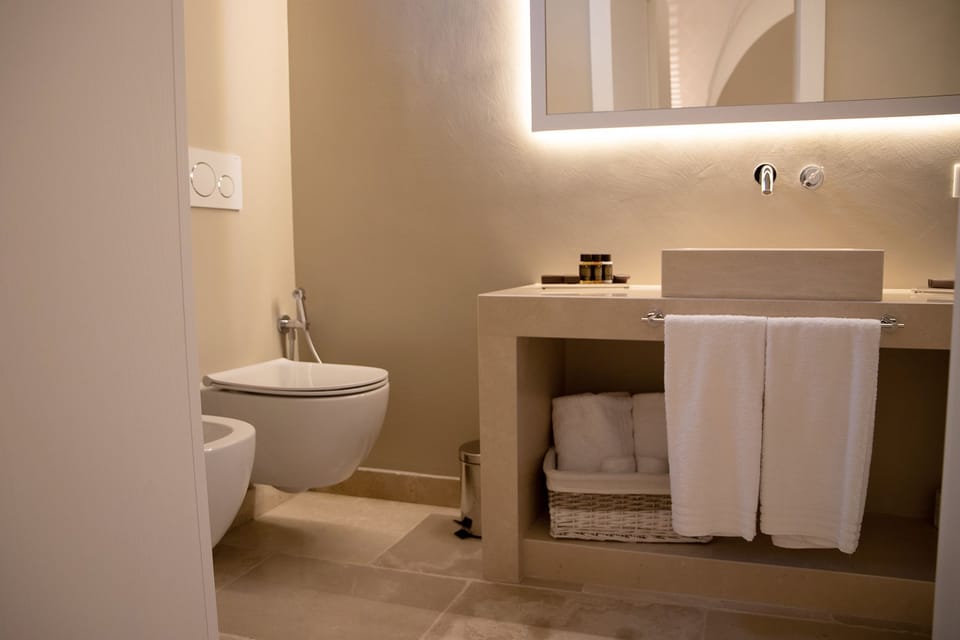 Comfort Suite, 1 Queen Bed with Sofa bed, Mezzanine | Bathroom | Hair dryer, slippers, bidet, towels