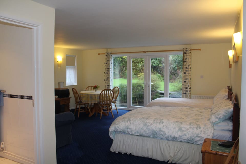 Family Room, Garden View | Hypo-allergenic bedding, iron/ironing board, free rollaway beds