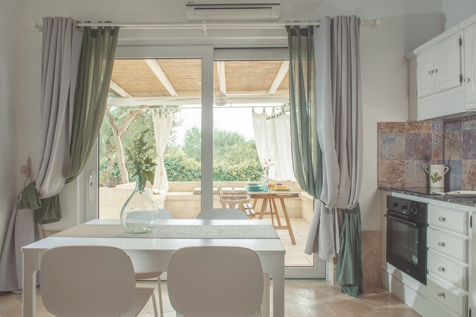 Apartment, Garden Area (Melograno) | Dining room