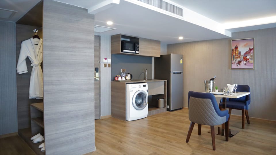 Centropolis Suite | Living area | Flat-screen TV