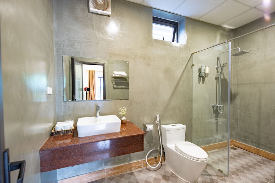 Shower, free toiletries, hair dryer, slippers