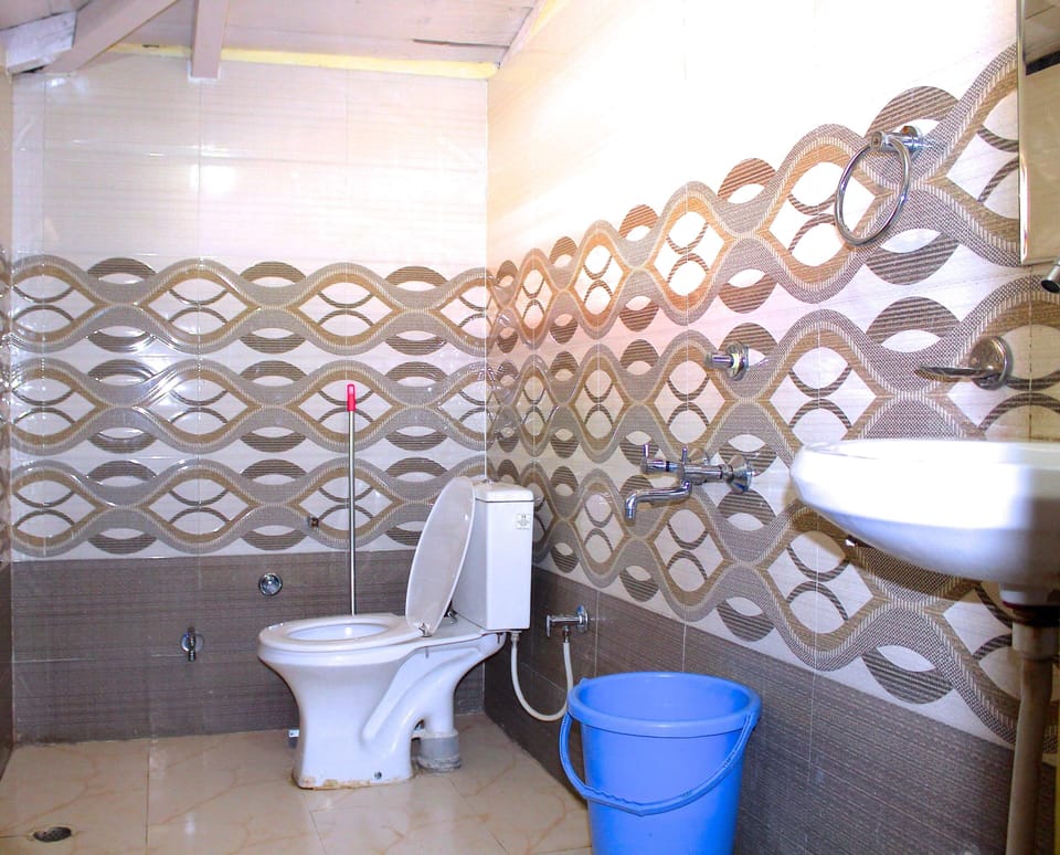 Shower, free toiletries, slippers, towels