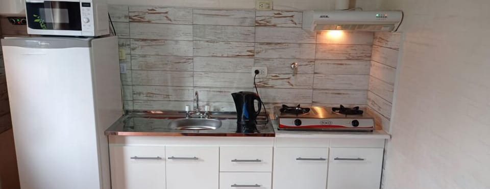 Bungalow, 2 Bedrooms, Garden View | Private kitchen | Microwave, cookware/dishes/utensils