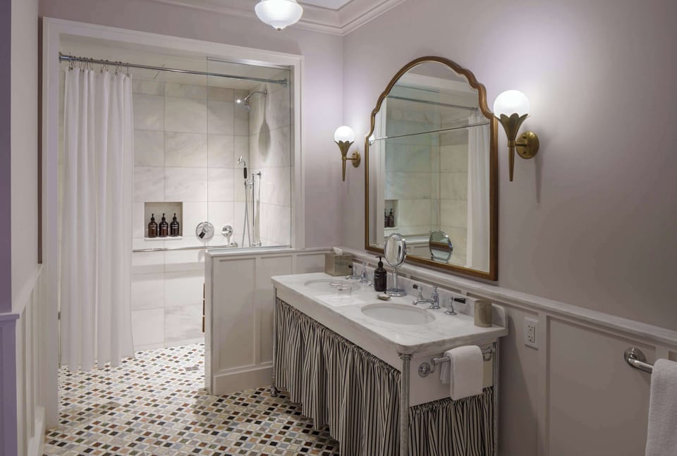 Separate tub and shower, deep soaking tub, designer toiletries