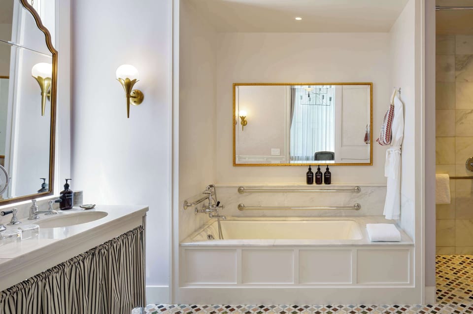 Separate tub and shower, deep soaking tub, designer toiletries