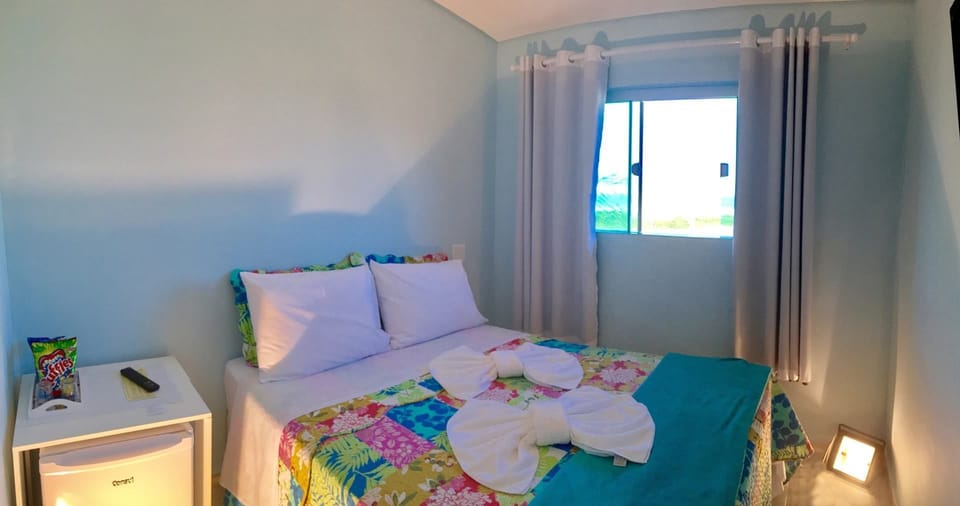 Quarto Standard com Ar Condicionado | Minibar, blackout drapes, free WiFi