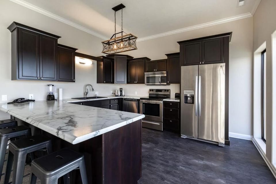 Microwave, coffee/tea maker, toaster, cookware/dishes/utensils