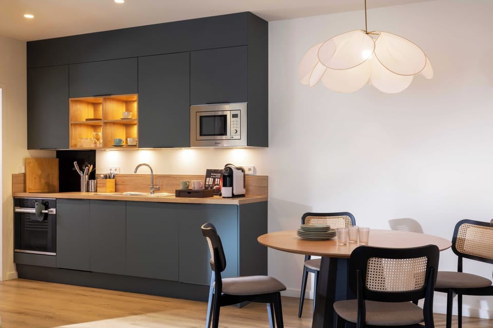 Classic Apartment | Living area | 21-inch LCD TV with cable channels, TV