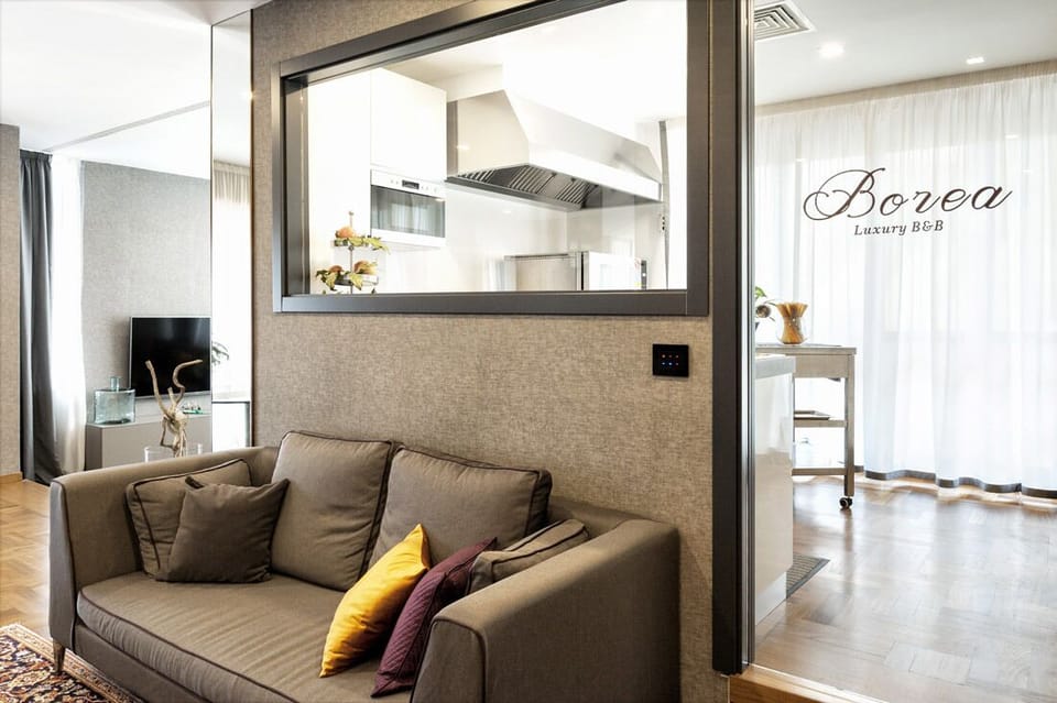 Deluxe Room | Living area | Flat-screen TV