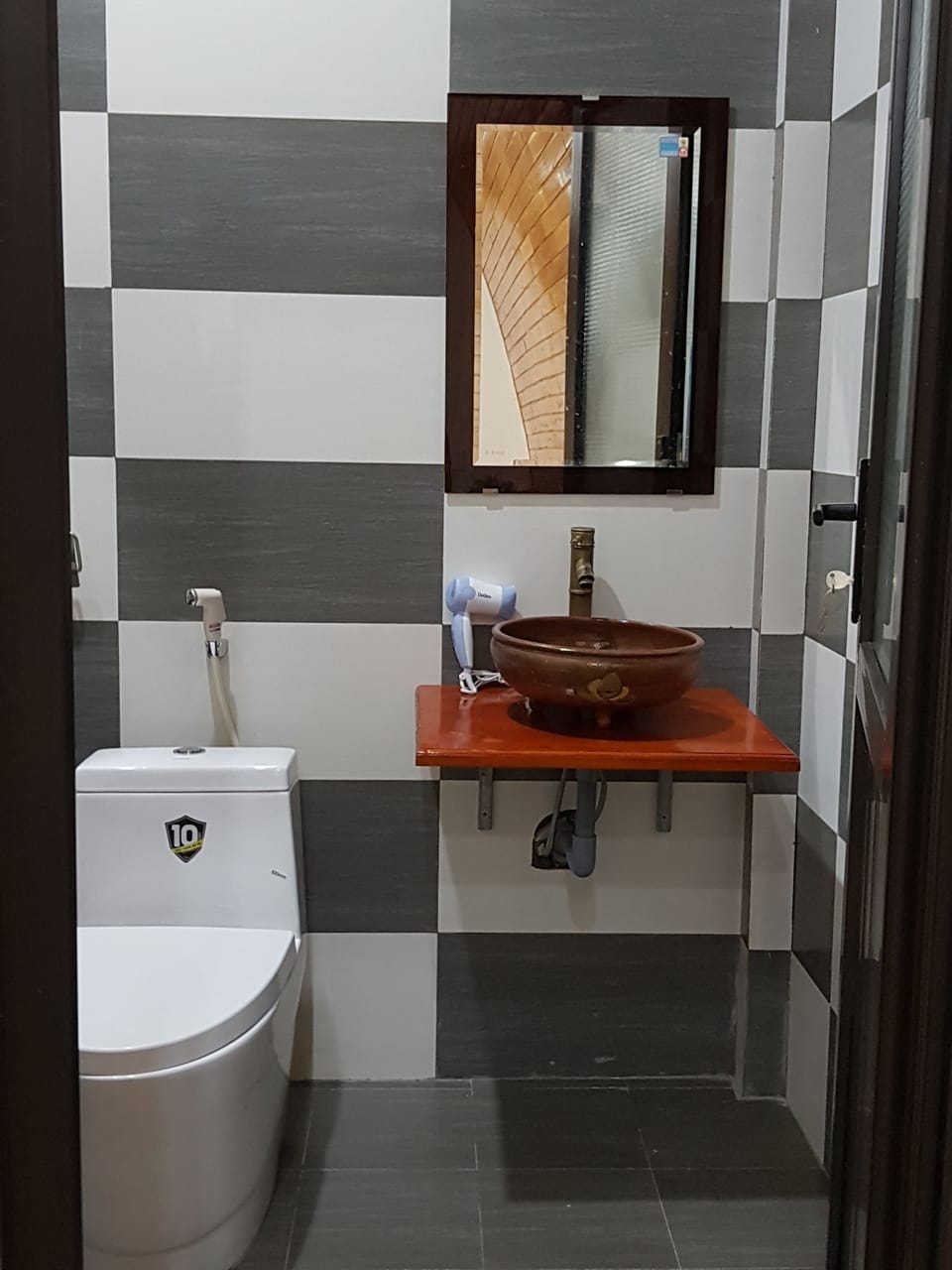 Shower, free toiletries, hair dryer, slippers