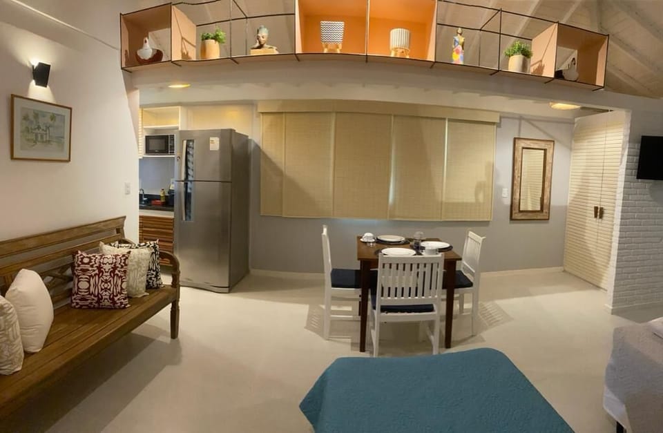 Deluxe Studio | Living area | 28-inch flat-screen TV with cable channels, TV