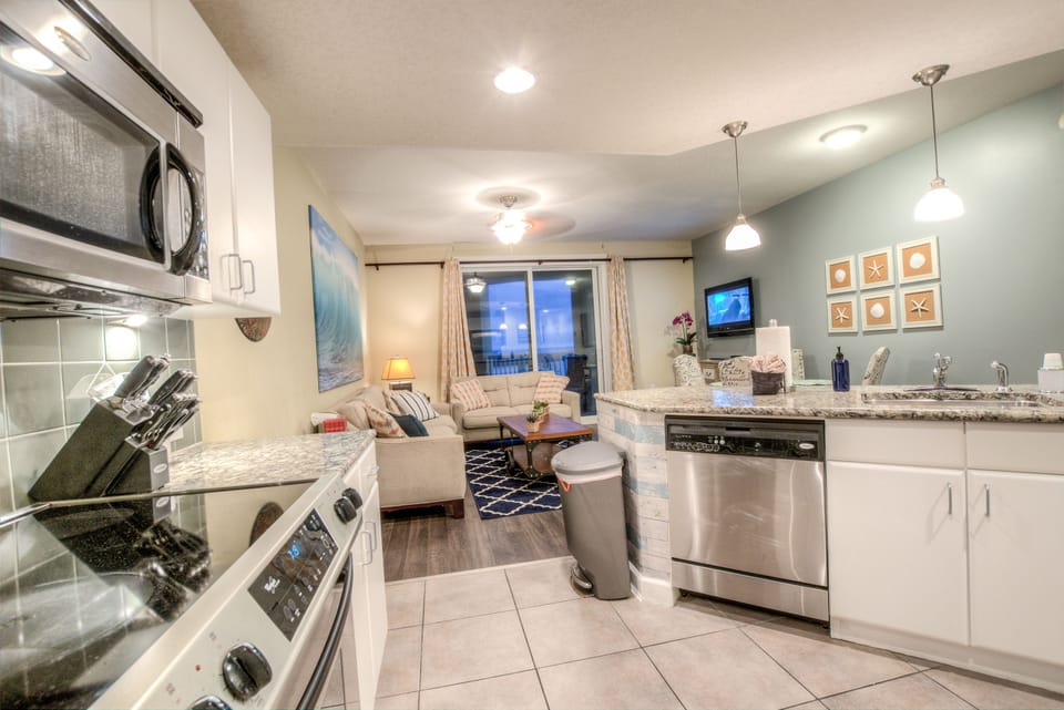 Condo, 1 Bedroom, Balcony, Beach View (2-202) | 1 bedroom, desk, iron/ironing board, free WiFi